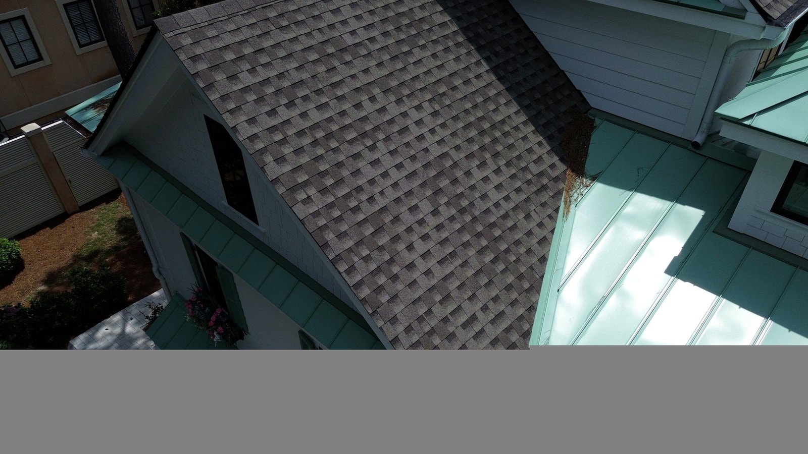 Mixed shingle and metal roof replacement on home in Hilton Head Island SC