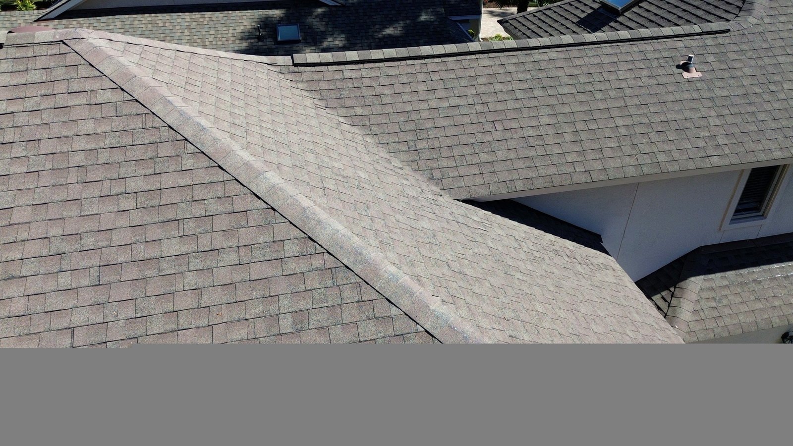 Aerial drone view of completed shingle roof replacement in Hilton Head Island SC