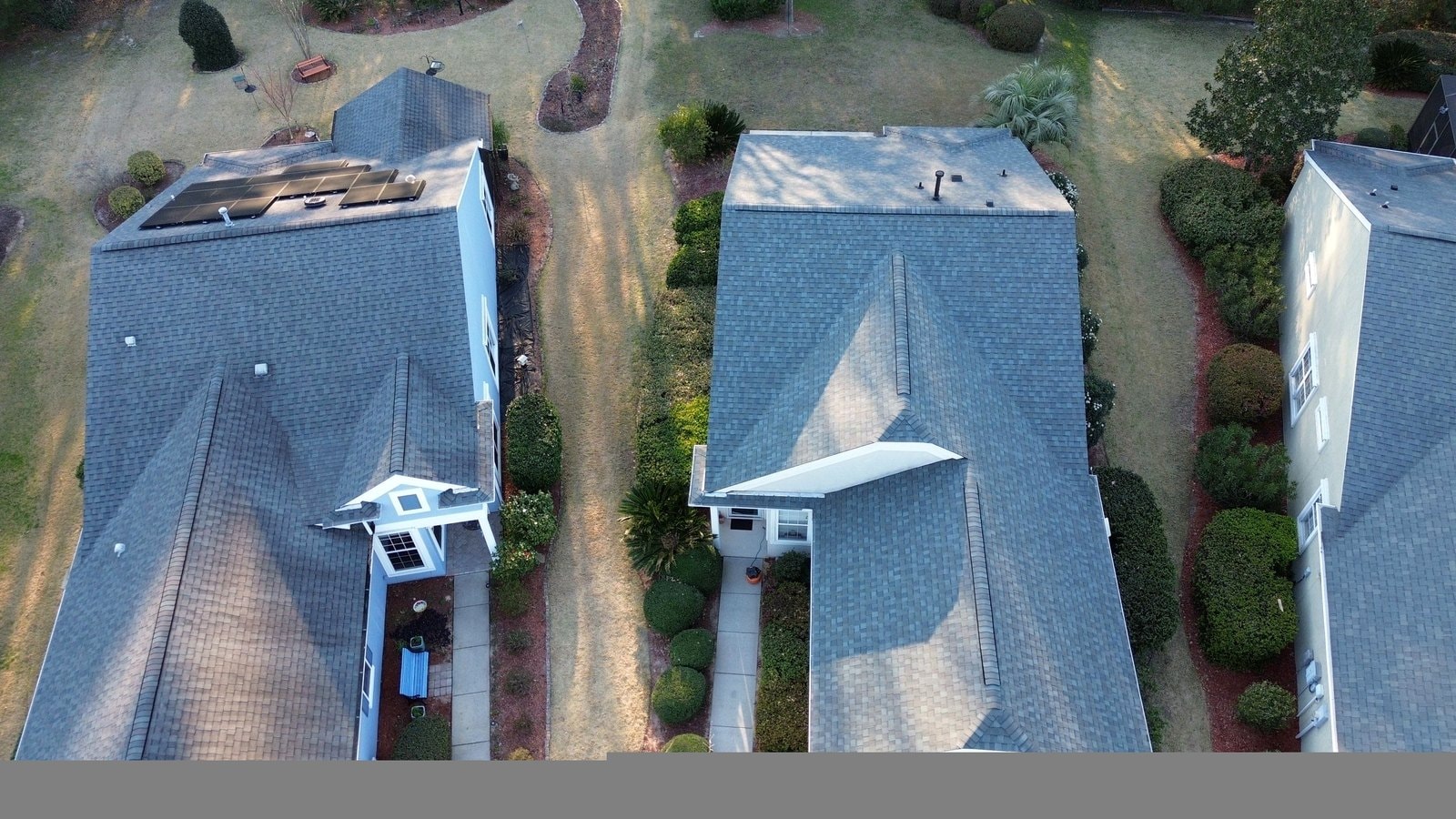 Aerial view of completed roof replacements on multiple homes in Bluffton SC