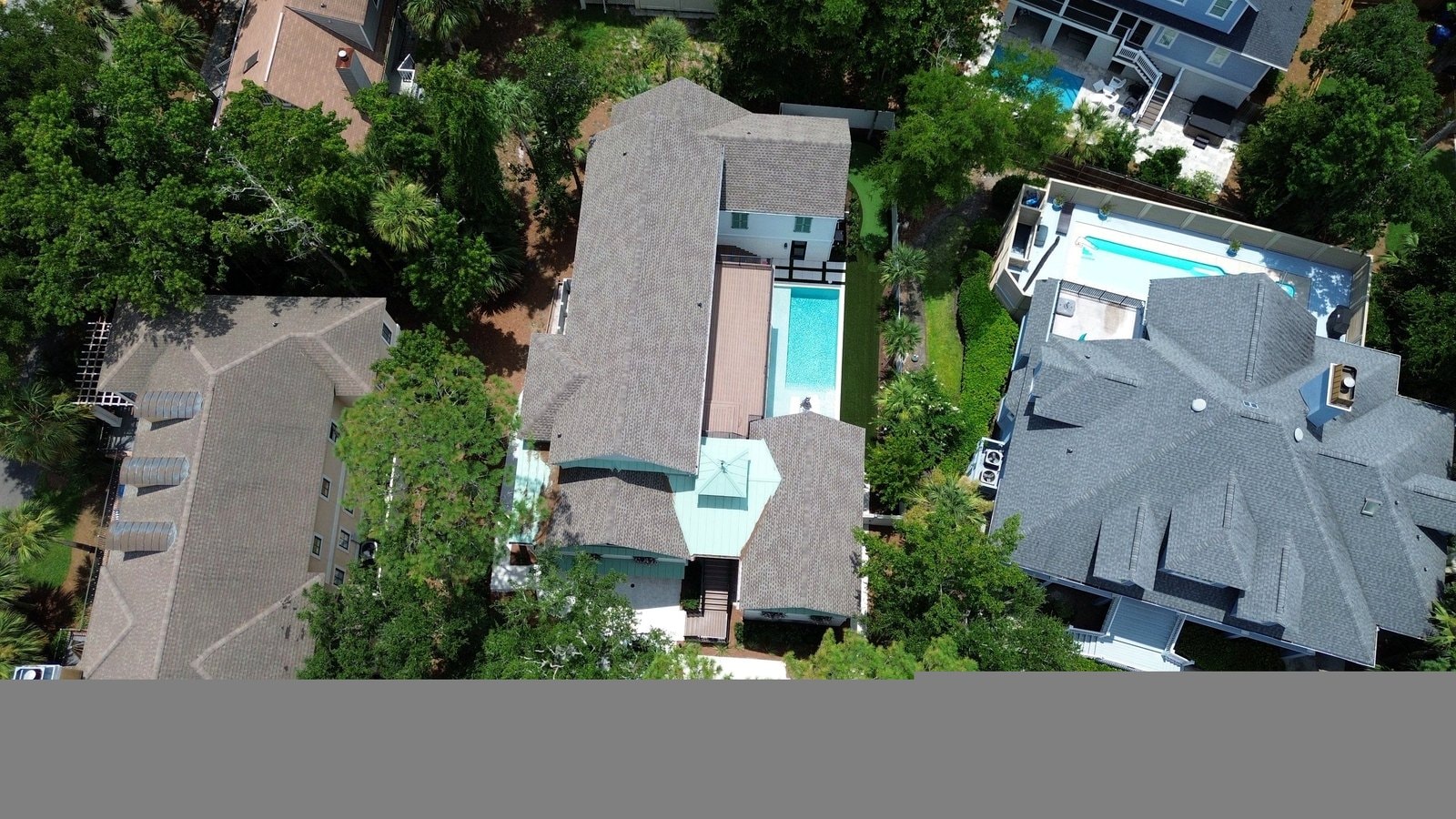 Aerial view of completed roof replacements in Hilton Head Island SC neighborhood